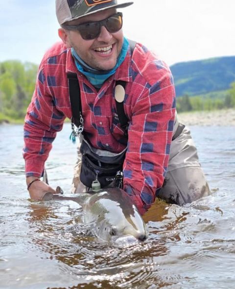 990-Gibbs-Levert-releases-a-30lb-salmon-at-Louis-Pool-photo-Joe-Thériault-Micmac-Camp