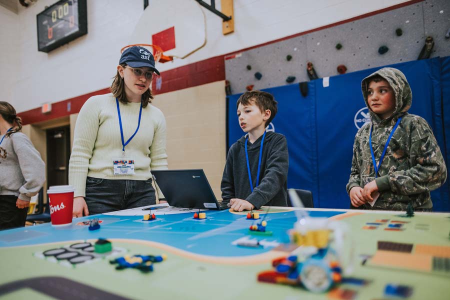 Kate Gingles, ASF Research and Wild Salmon Watersheds technician, advises a team on salmon conservation.