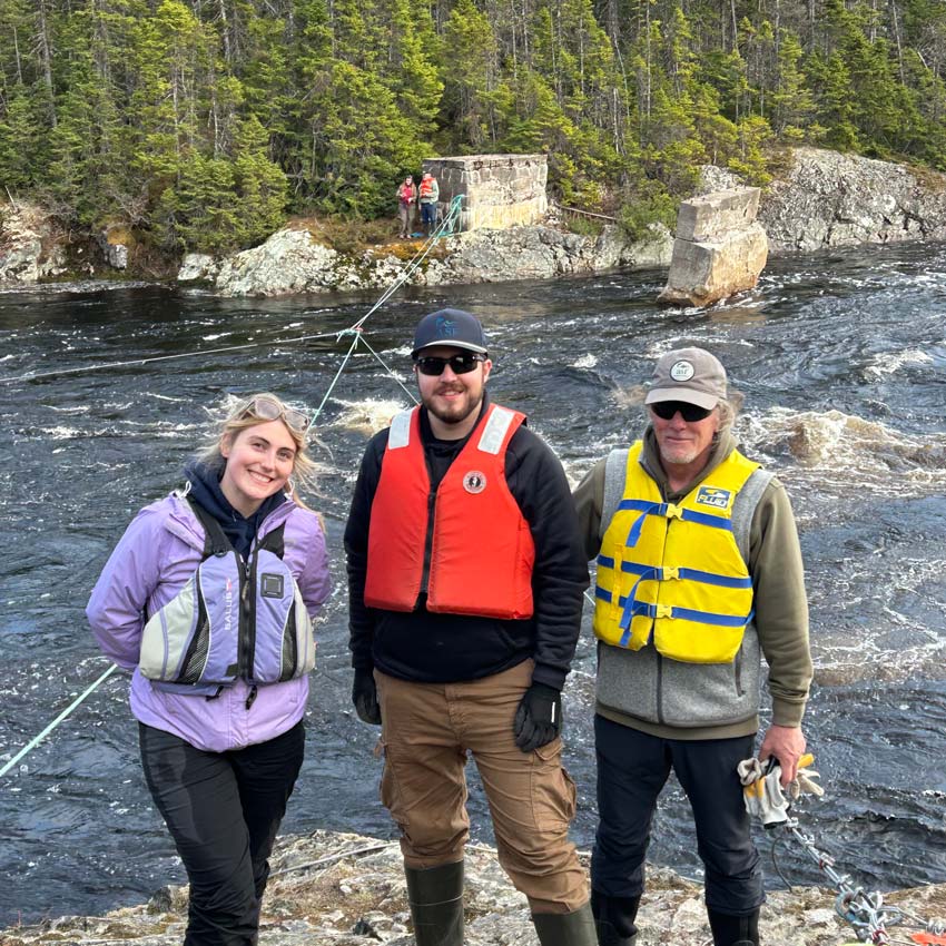Assessing raging waters on the Terra Nova River were (l to r) Ashlen Mersereau, Sean Jackson, and Jon Carr, with Carly McLennon and John Baird in the background. Photo: Kim Thompson