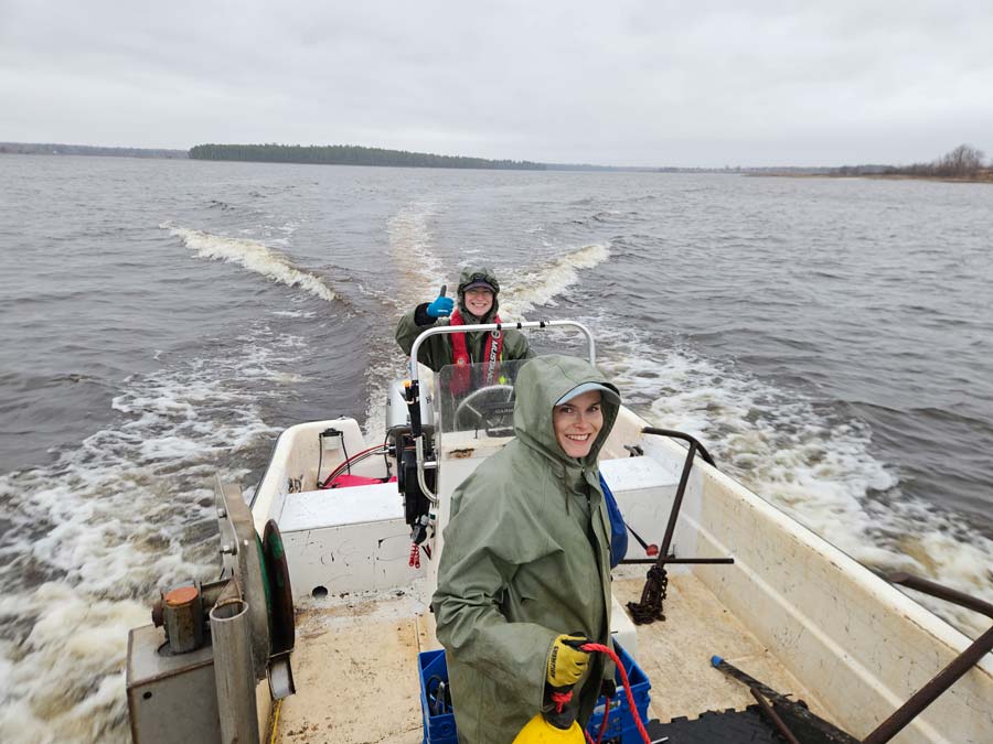 ASF's Kate Gingles (giving the thumbs up) and Heather Perry deploy receivers on the Miramichi River. Photo: Graham Chafe 