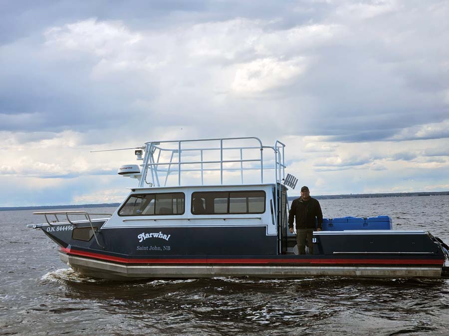 Mario Theriault of the Canadian Rivers Institute aboard the Narwhal. Photo: Graham Chafe