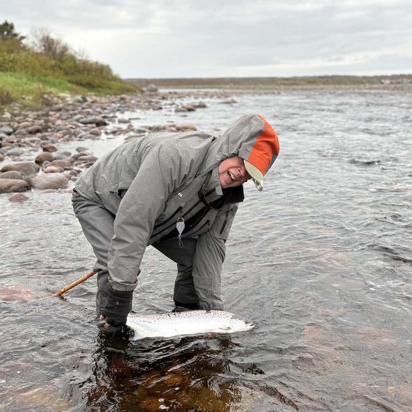 Bob Bishop with a fine salmon he hooked after just five minutes of fishing. <br>Photo: Dave Hennessey