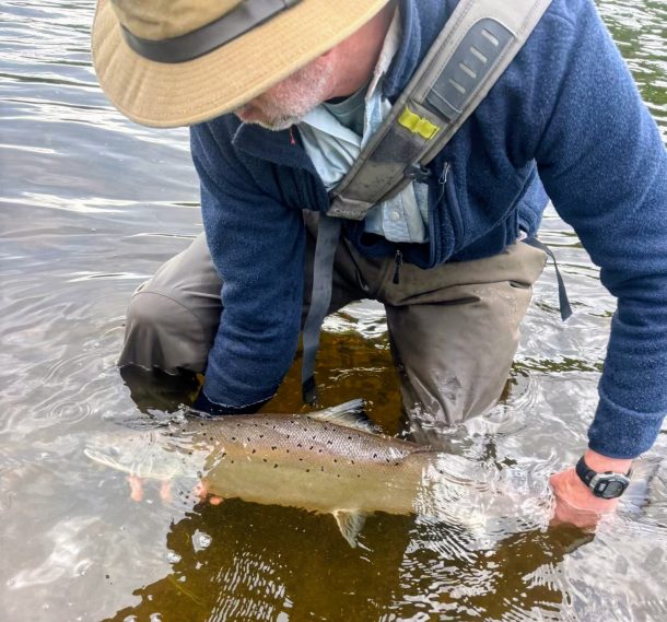 Harold Berry with a bright salmon from the Southwest Miramichi.