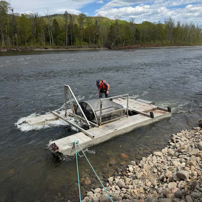 ASF's Jon Carr prepares a smolt wheel for removal. Photo: Deirdre Green
